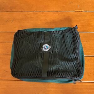 Green and Black Eagle Creek Packing Bag